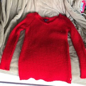 Red cable knit sweater